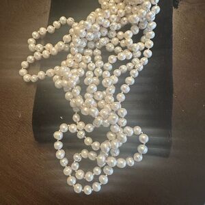 Gorgeous long strand of  vintage authentic genuine pearls.